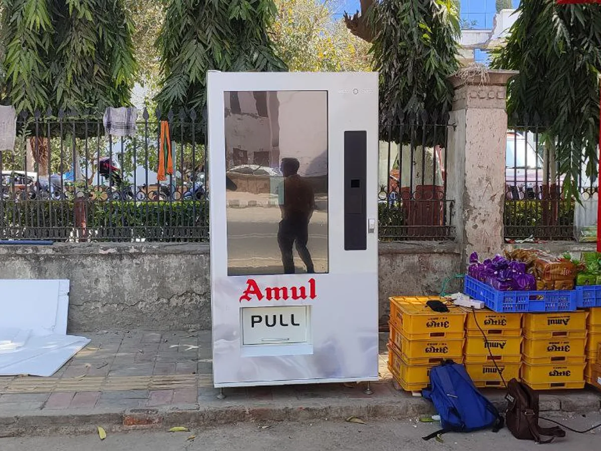 Underused vending machine in a tiny near-empty office illustrating a placement to avoid
